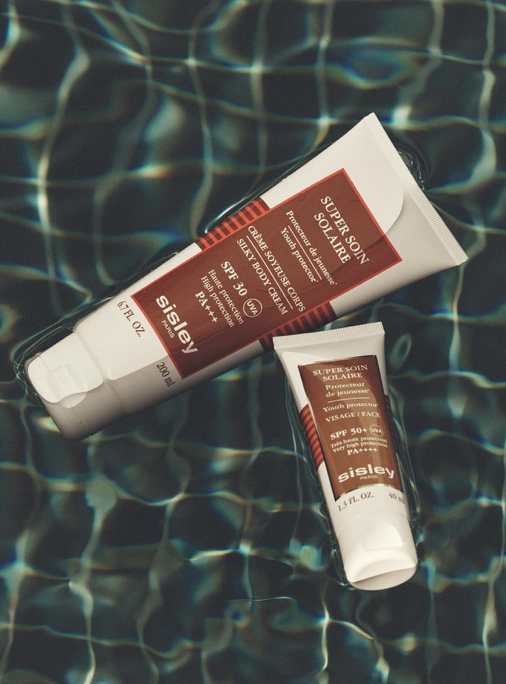 Sisley sun care beside water